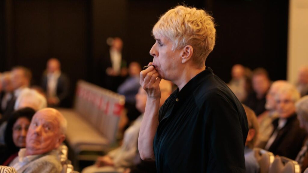 Protesters blew whistles during Woodside chief Meg O’Neill’s opening at the company’s AGM.