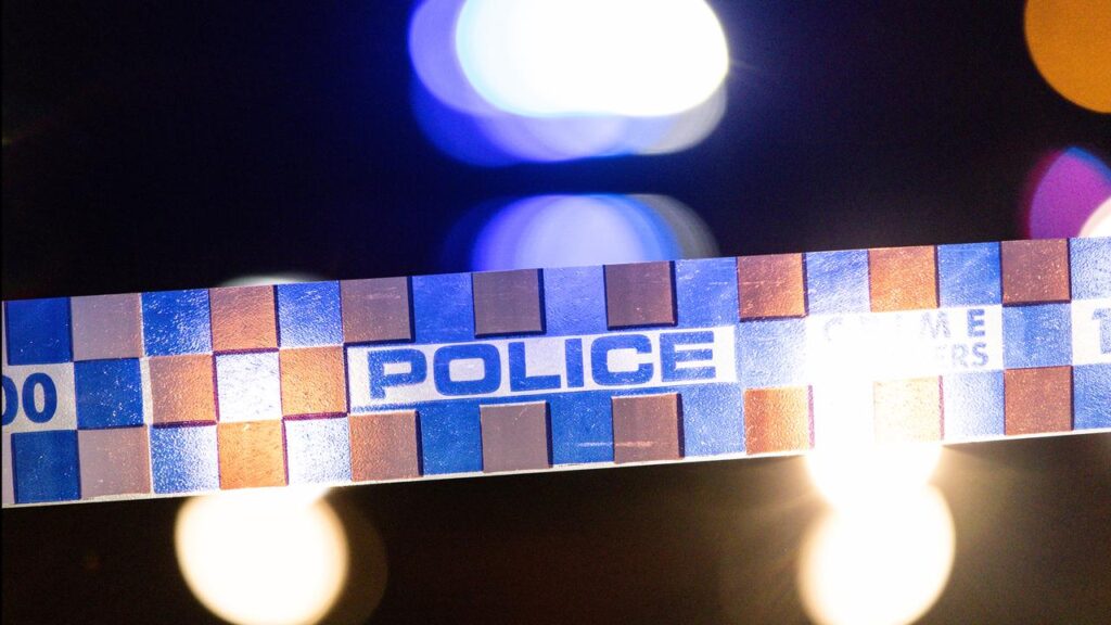 A woman is assisting police with their enquiries after a child was found dead at a home.
