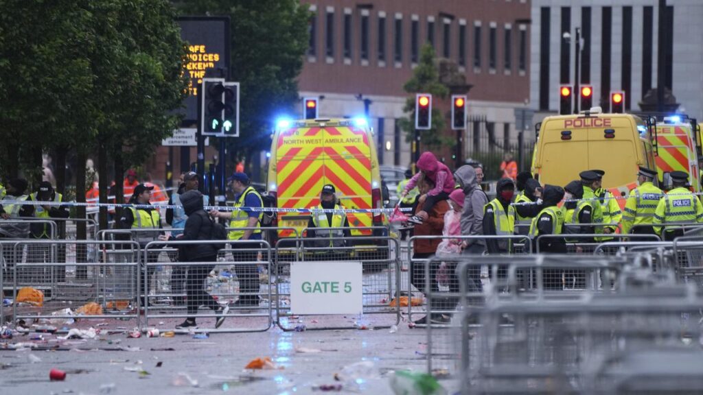 A man has been arrested after a car ploughed into Liverpool’s title parade in the city centre.