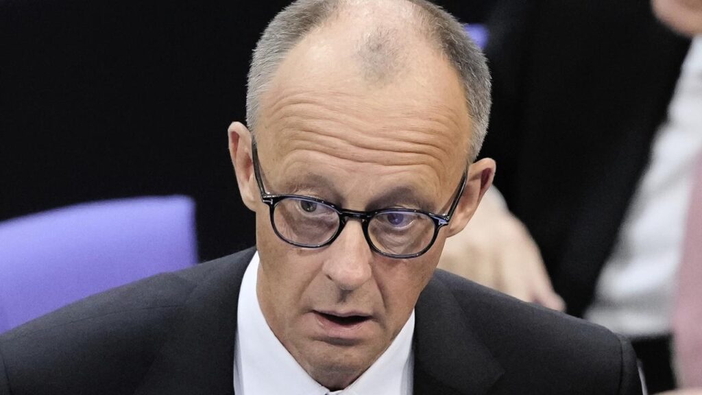 A surprised Friedrich Merz has to regroup after not winning enough votes in the first round.