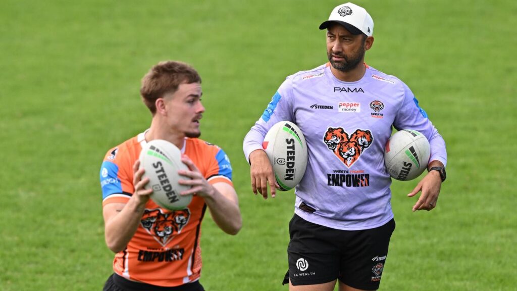 Wests Tigers coach Benji Marshall (right) is looking to a future without Lachlan Galvin (left).