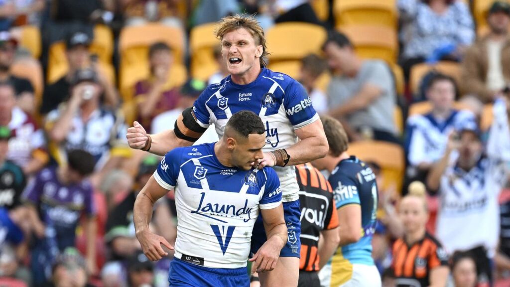Canterbury winger Jacob Kiraz is jumped on by teammate Jacob Preston after one of his three tries.

