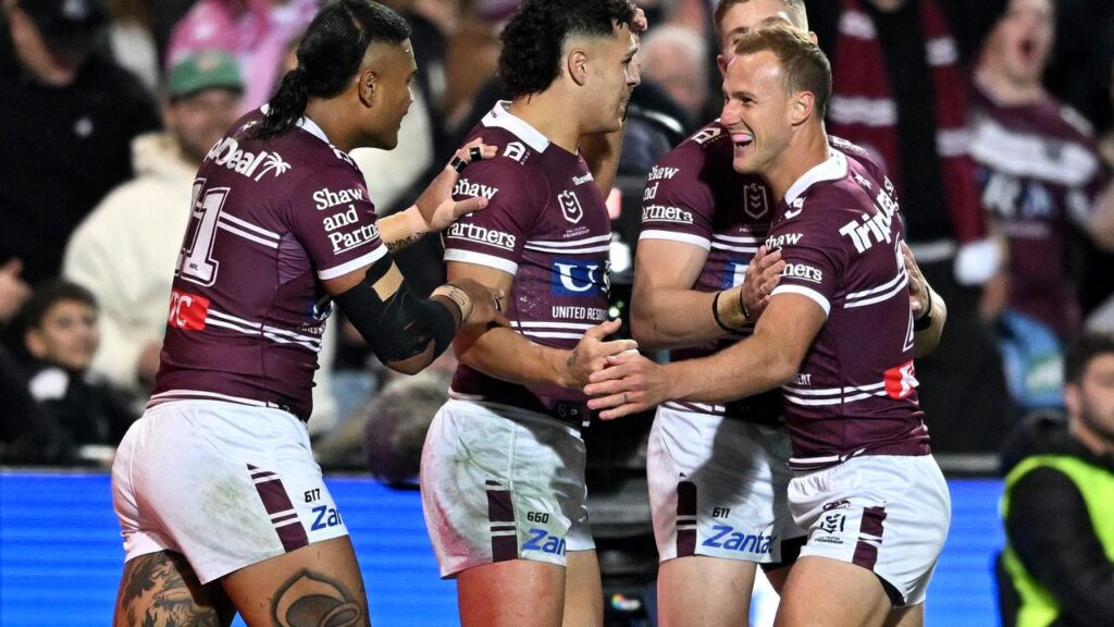 Daly Cherry-Evans (right) played a sensational game to lead Manly to a crushing win over Brisbane.