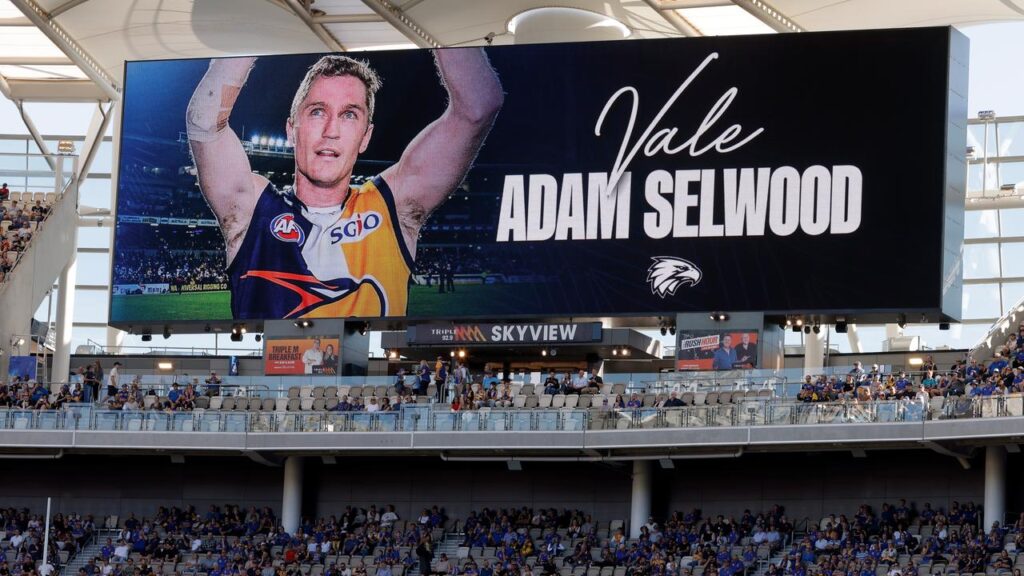The big screens at Optus Stadium were used to pay tribute to Adam Selwood.