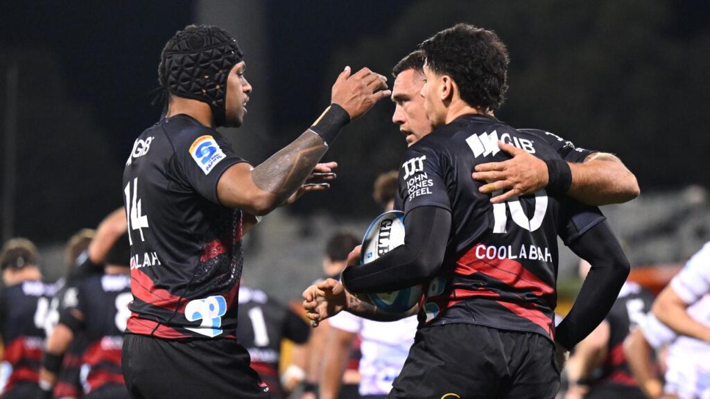 The Crusaders have locked up a top two spot with a thrilling win in Canberra.
