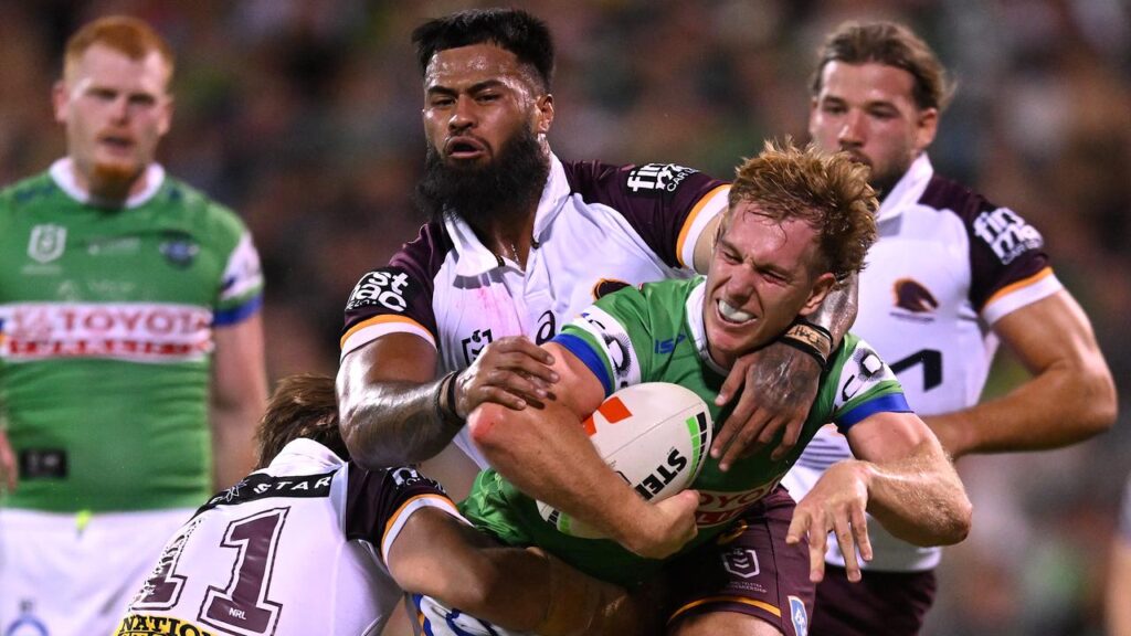 Props Payne Haas (centre) and Pat Carrigan (far right) have carried the Broncos pack in 2025.