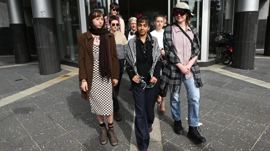 Aahana Nag (centre) has been sentenced to community service for vandalising Peter Dutton’s office.