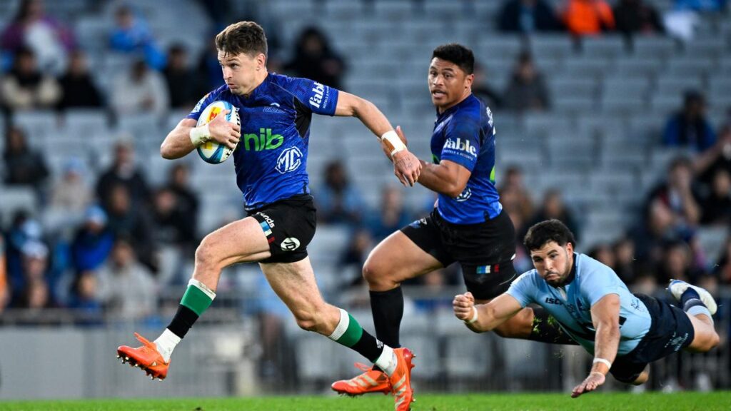 Beauden Barrett proved to be a menace as the Blues ran away with victory against the Waratahs.