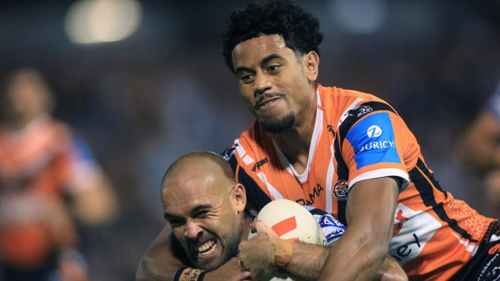 Jahream Bula (R) has brushed of speculation about his future with Wests Tigers.
