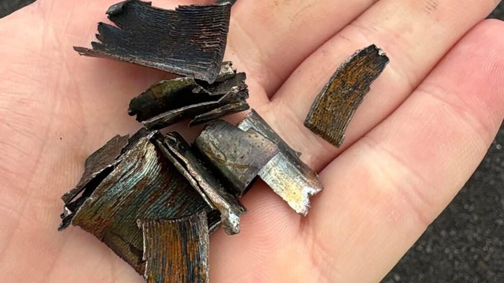 Shards of metal deflated the tyres of hundreds of vehicles on the M1 Motorway.