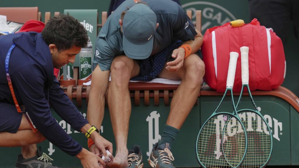 Alex de Minaur had treatment on his right foot during his fleet-footed win over Laslo Djere.