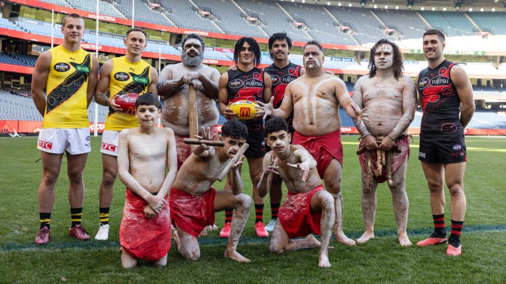 Indigenous performers and Richmond and Essendon players get an early taste of the MCG.