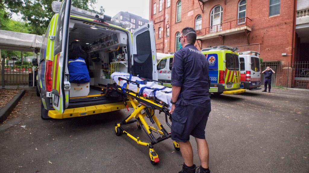 Paramedics found a woman dead in her apartment more than seven hours after she called triple zero.