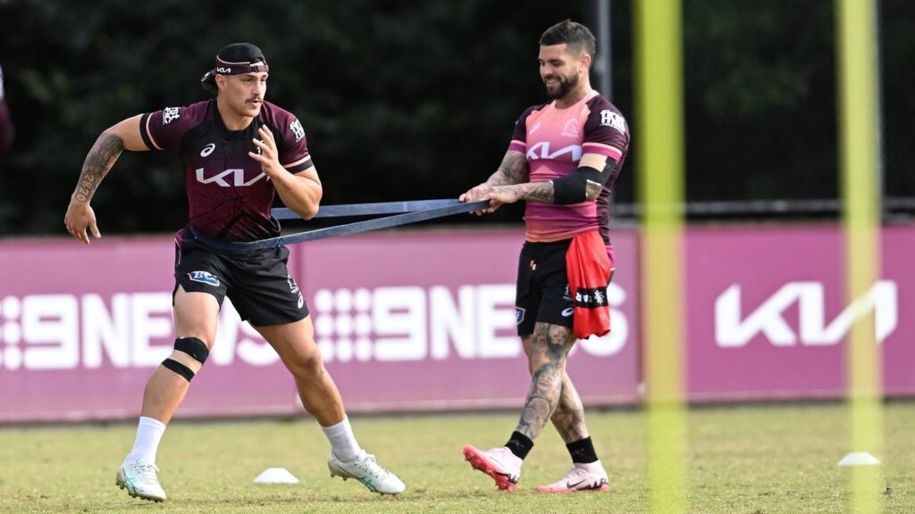 Kotoni Staggs (l) and Adam Reynolds (r) have slammed claims of player unrest with the Broncos coach.