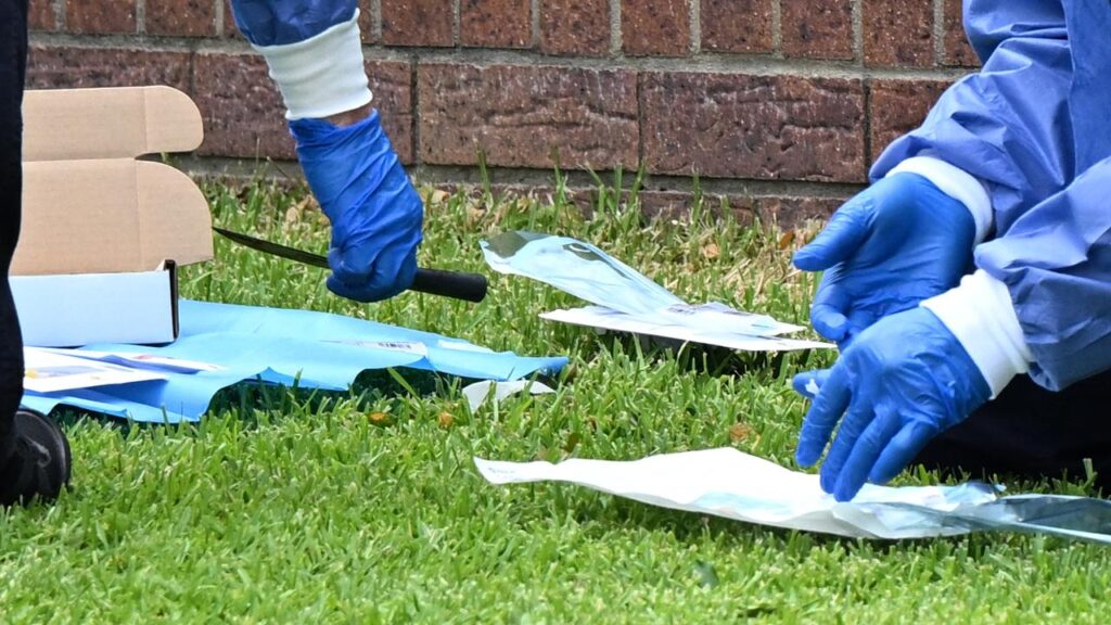 Forensic Science Queensland’s director has been suspended in the wake of DNA contamination claims.
