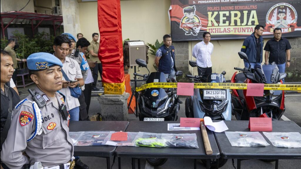 Police display evidence related to the shooting of two Australians in Bali.