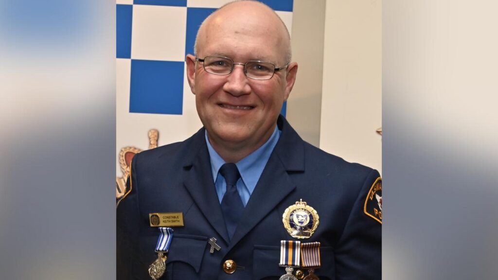 Constable Keith Anthony Smith was killed while delivering a home repossession order.