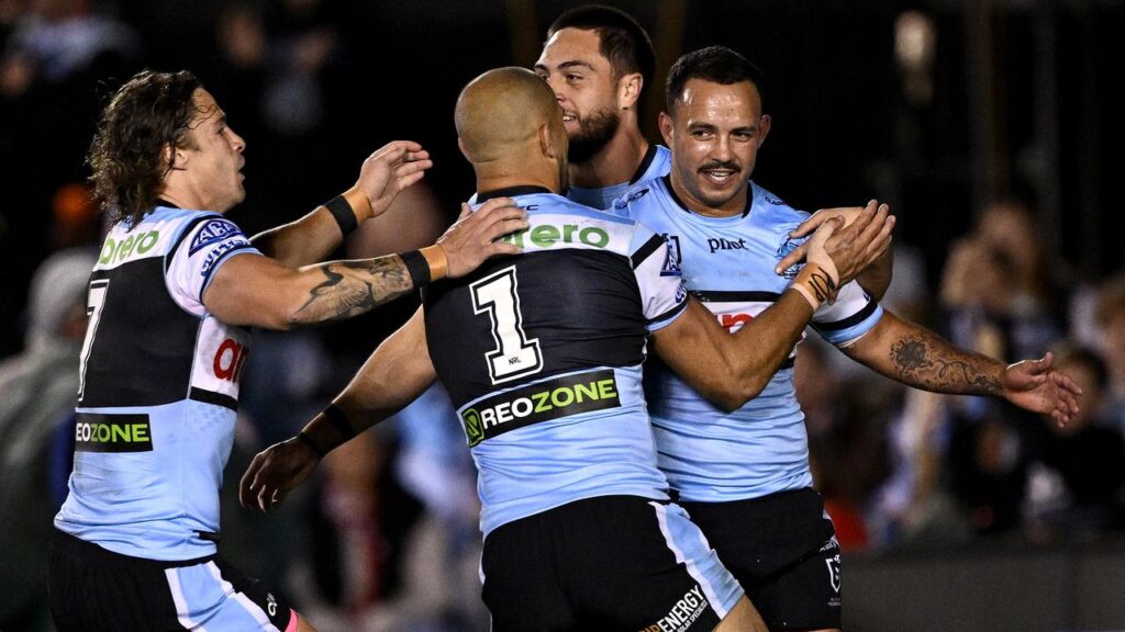 Sharks players had plenty of reason to congratulate Braydon Trindall (r) as they beat the Dragons.