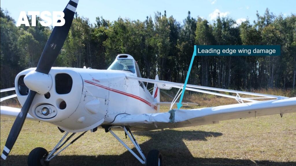 A pilot was able to safely land a plane after a mid-air collision, despite damage to its wing.