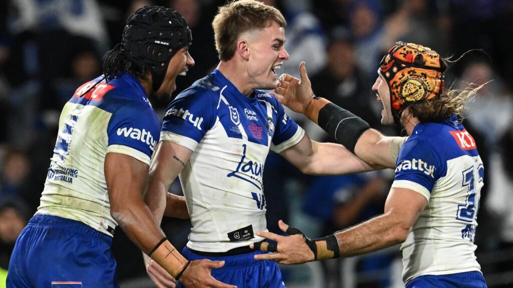 Lachlan Galvin (c) celebrates his try on debut for Canterbury amid huge cheers from Bulldogs’ fans.