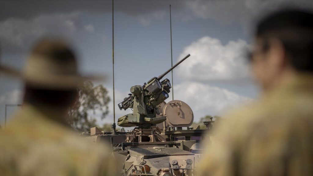 Australia says it will not be dictated to over how much it should spend on defence.