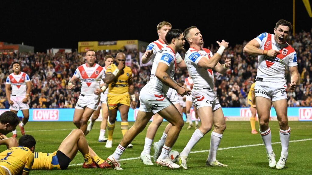 Tryscorer Kyle Flanagan (r) answered critics as the Dragons edged out the Eels in an NRL thriller.
