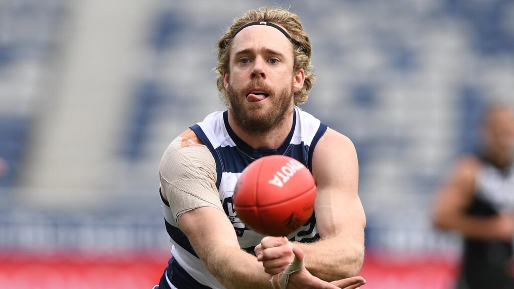 Cam Guthrie gets a handball away during last season’s VFL semi-final against the Southport Sharks.