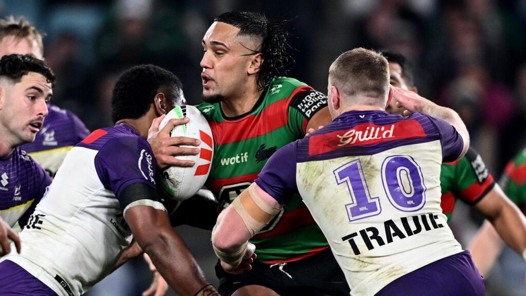 Rabbitohs powerhouse Keaon Koloamatangi (c) played with a broken eye socket against Melbourne.