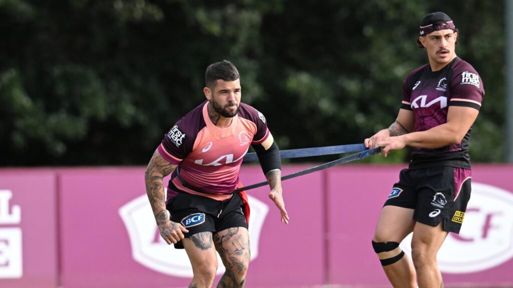 Adam Reynolds (L) and Kotoni Staggs (R) will remain in Broncos colours for a little while longer.