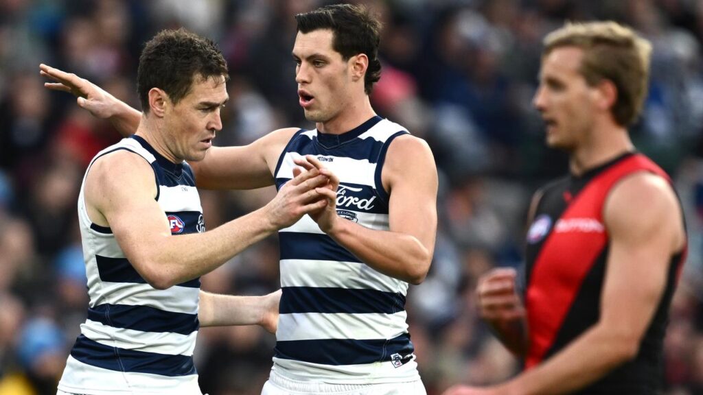 Jeremy Cameron (left) and Shannon Neale (centre) kicked 10 goals between them against the Bombers.