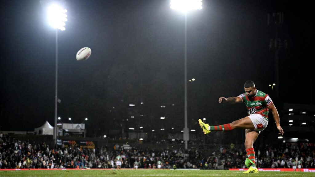 Latrel Mitchell kicks for South Sydney against hosts Wests Tigers at Campbelltown Stadium.