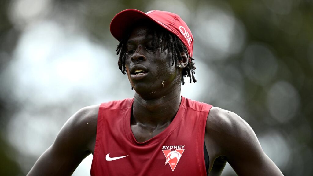 Riak Andrew will serve a five-week ban for a homophobic slur he now “deeply regrets”.