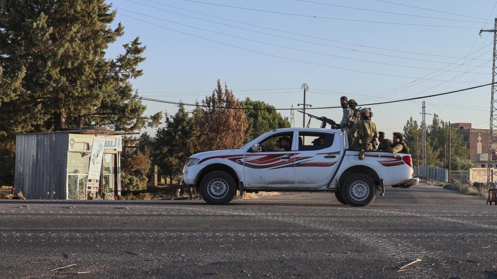 Syria’s defence ministry says “outlawed groups” have attacked government security forces.