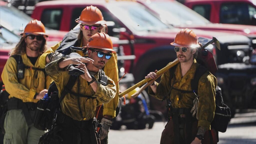 Idaho firefighters are in mourning for two colleagues shot dead at the scene of a wildfire.