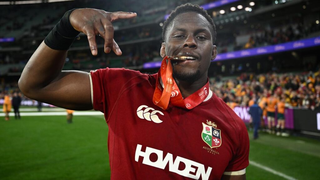 Lions’ Maro Itoje celebrates with his player-of-the-match medal following victory over Australia.