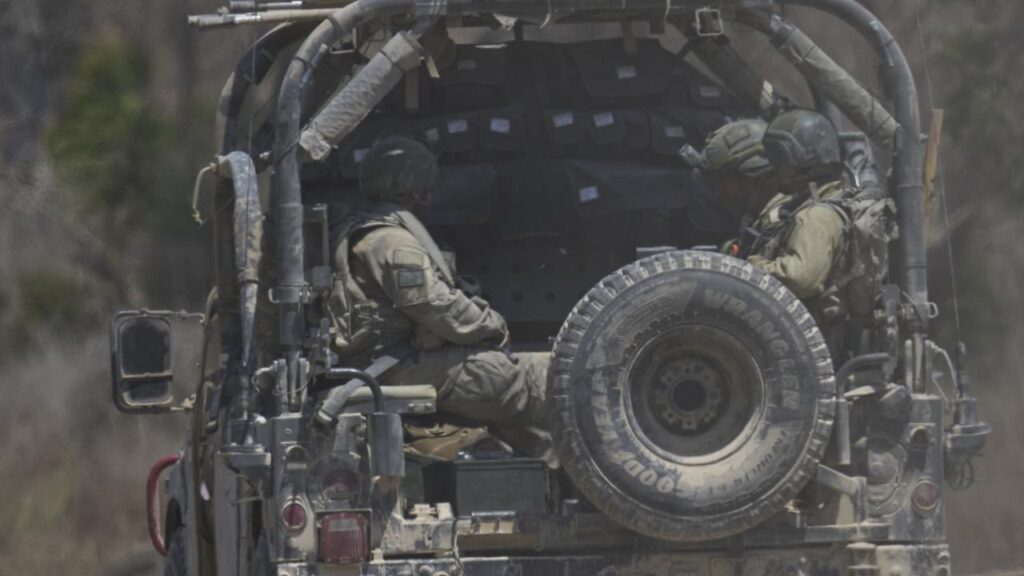 The Israel army says it fired warning shots at suspects who approached its troops and did not stop.