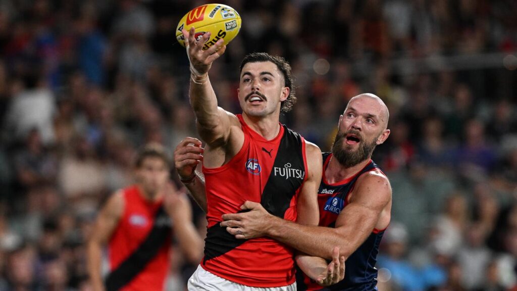 Essendon star Sam Draper (l) has been linked to a move to Brisbane.