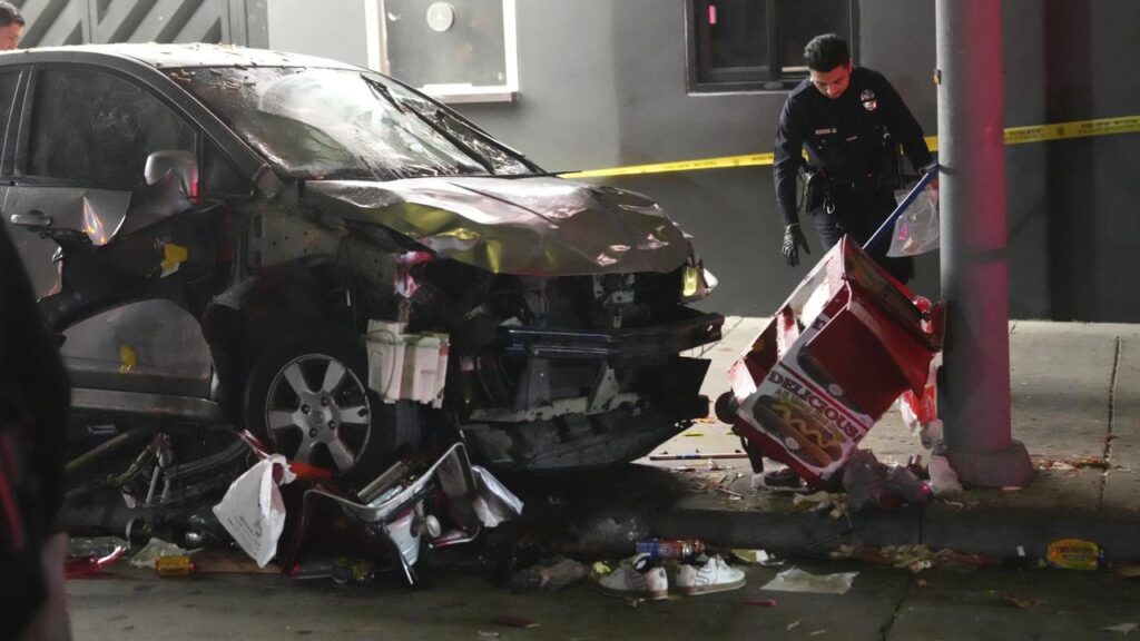 Dozens of people have been injured after a car rammed into them outside a nightclub in Los Angeles.