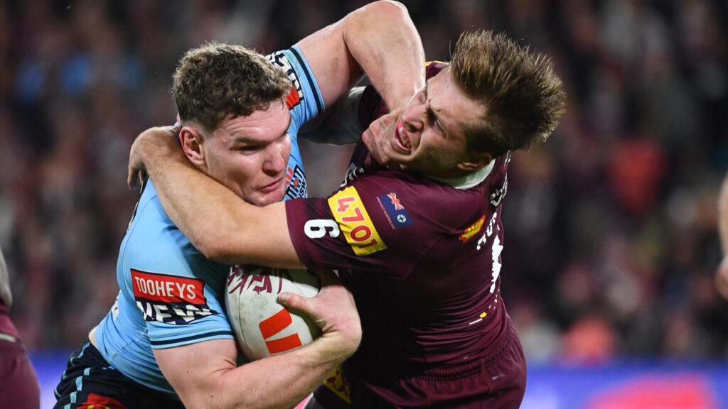Liam Martin (l) is determined to get back on top in his running Origin battle with Cameron Munster.