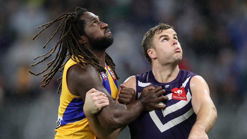 The art of a ruckman like Nic Naitanui (l) may be forever lost to the game worry AFL coaches.