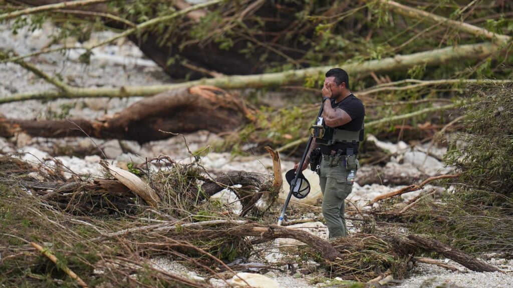 Authorities say more than 850 people wer rescued, including some clinging to trees, after flooding.
