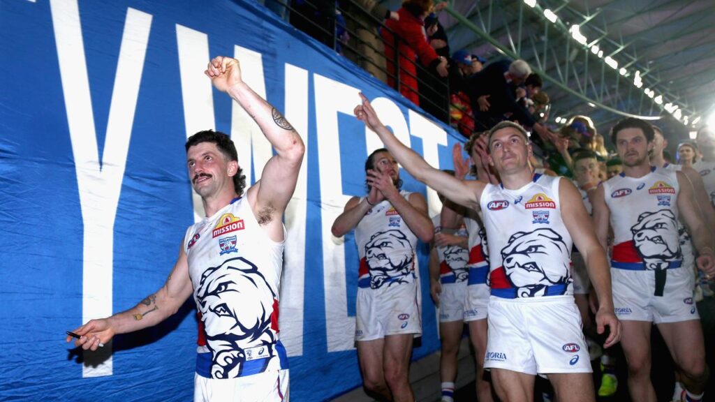 Western Bulldogs star Tom Liberatore (L) celebrated his 250th game with a win over North Melbourne.