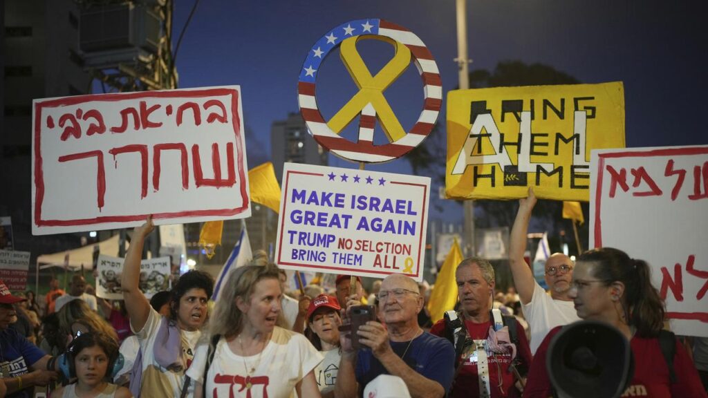 Protesters in Tel Aviv have urged a ceasefire deal and the release of hostages held by militants.