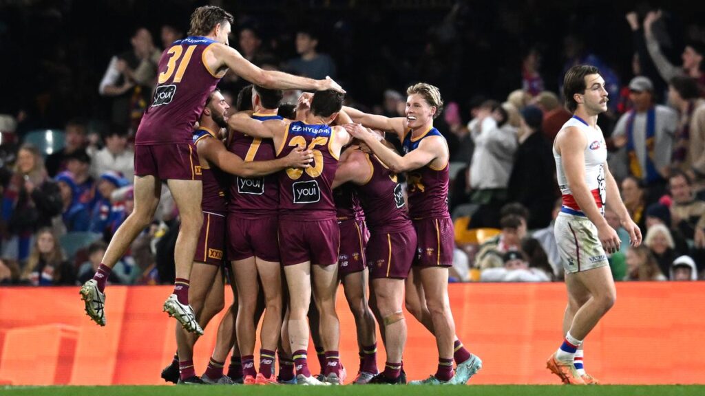 Brisbane celebrate Will Ashcroft’s goal on the siren in a tight win over the Western Bulldogs.
