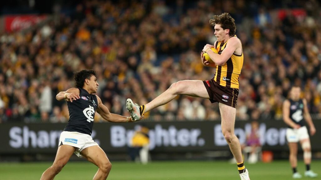 Will Day (r) looms as a key figure in the Hawks’ finals push after 15 disposals against Carlton.