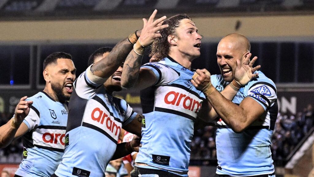 Nicho Hynes answered critics with his two-try display as the Sharks downed the Dolphins.