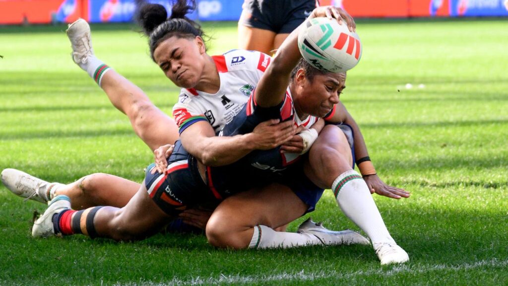 Taina Naividi scores one of her three tries for the Sydney Roosters as they beat the Warriors.