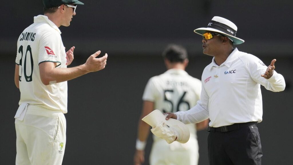Pat Cummins and umpire Nitin Menon had a discussion over Australia’s run-out appeal at Sabina Park.