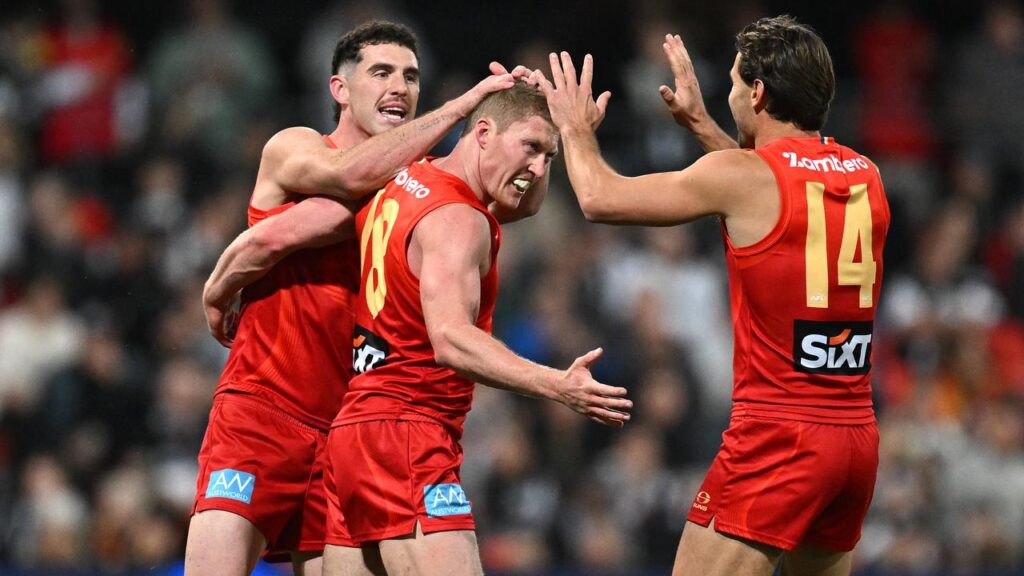 Matt Rowell (c) led the way as Gold Coast beat Collingwood in a thriller.
