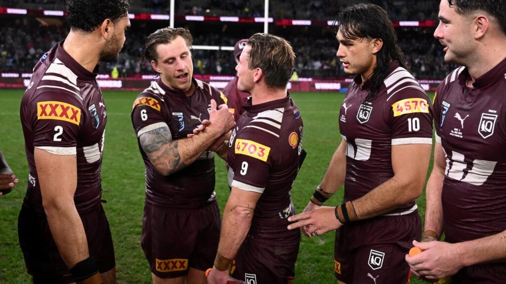 Queensland players have vowed to support Cameron Munster (second left) after his father’s death.
